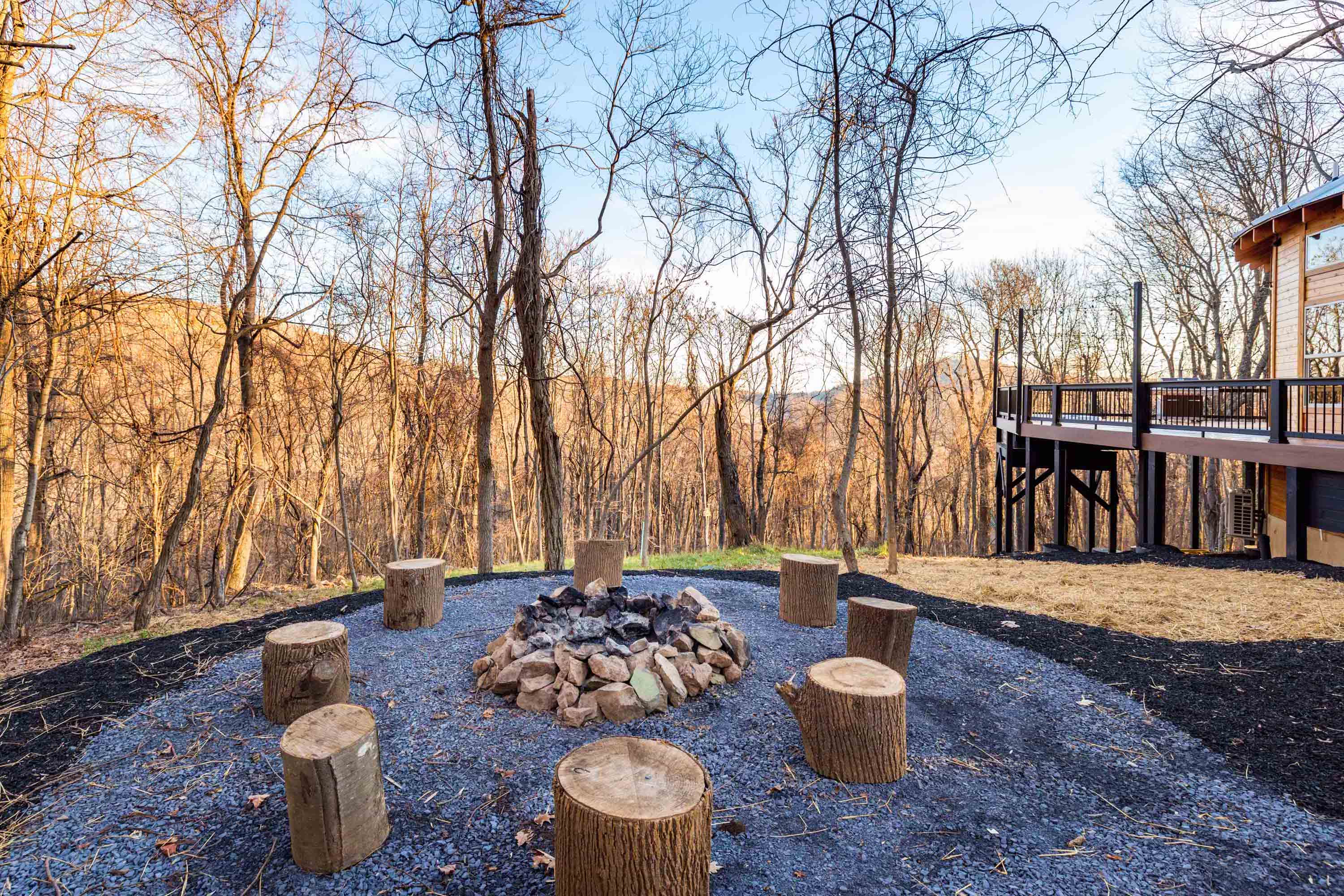 <span  class="uc_style_uc_tiles_grid_image_elementor_uc_items_attribute_title" style="color:#ffffff;">Firepit area with a cornhole game</span>