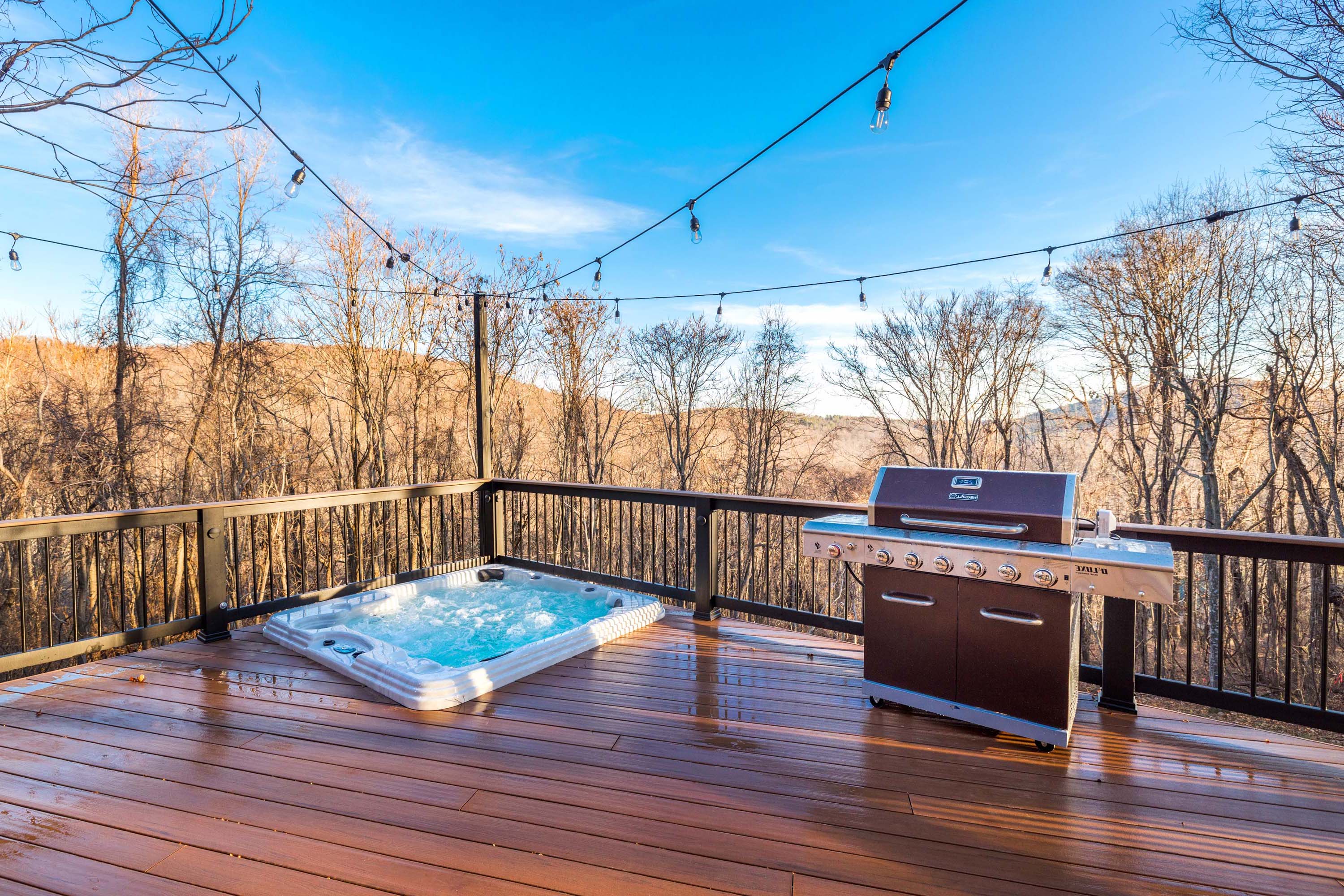<span  class="uc_style_uc_tiles_grid_image_elementor_uc_items_attribute_title" style="color:#ffffff;">Large grill and 7 person Hot Tub with Bluetooth speakers</span>