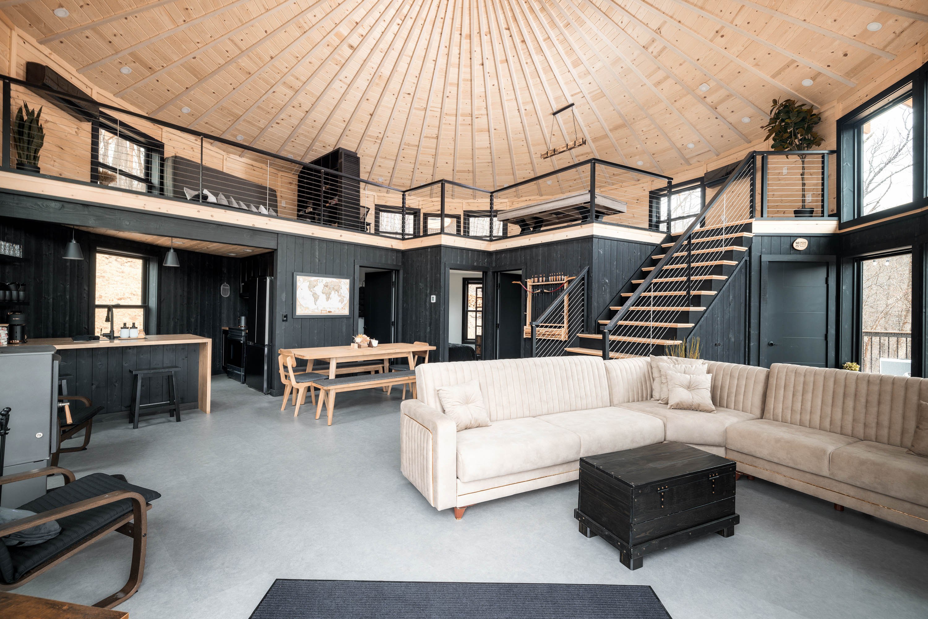 <span  class="uc_style_uc_tiles_grid_image_elementor_uc_items_attribute_title" style="color:#ffffff;">Large Living Area with Wood Stove, Loft, Dining Table for 8, Full Kitchen, Lounge Chairs, Archery Set - Skyline Yurt</span>