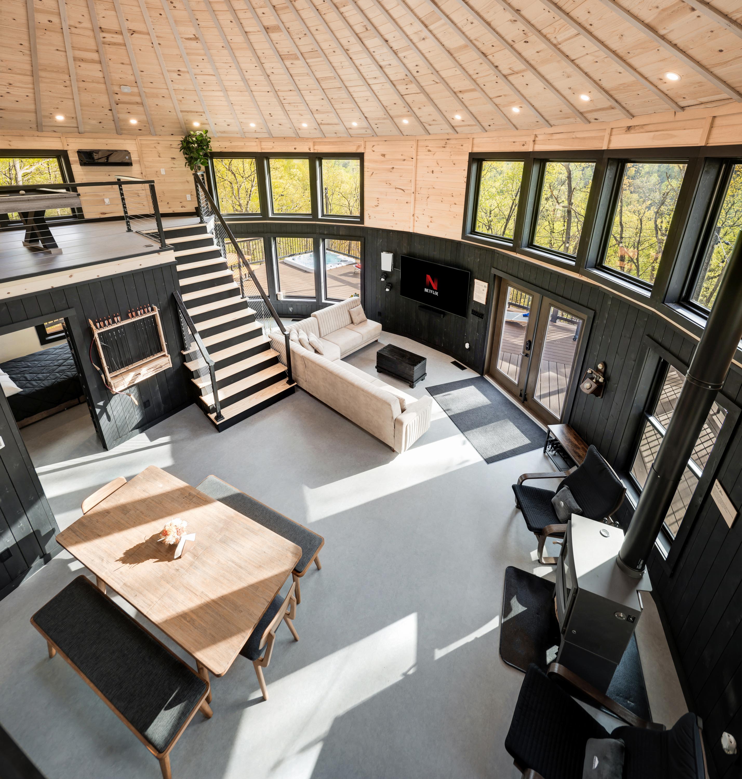<span  class="uc_style_uc_tiles_grid_image_elementor_uc_items_attribute_title" style="color:#ffffff;">View from Loft, Dining Table, Wood Stove, Lounge Chairs, 75-inch TV, PS5, Panoramic Windows, Archery Set, Modern Interior - Skyline Yurt</span>